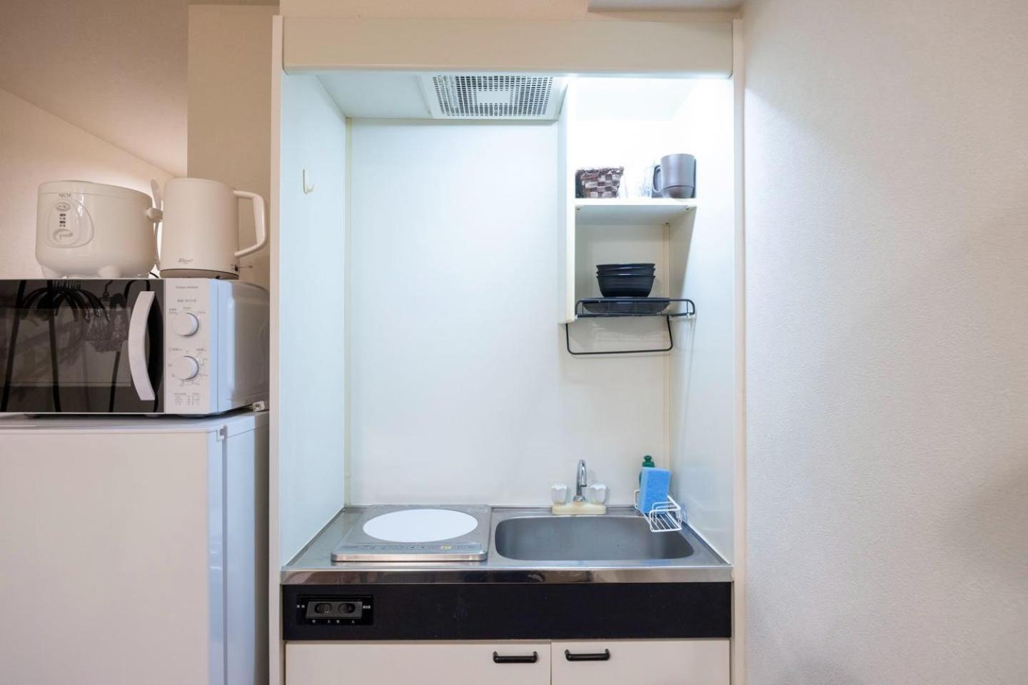 Shinjuku Okada Building Apartment Tokyo Bagian luar foto