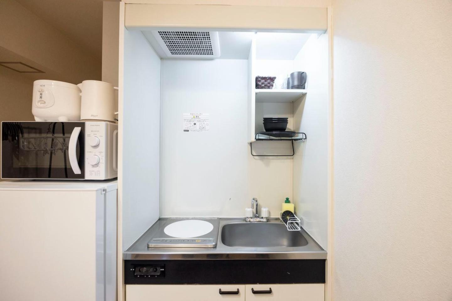 Shinjuku Okada Building Apartment Tokyo Bagian luar foto